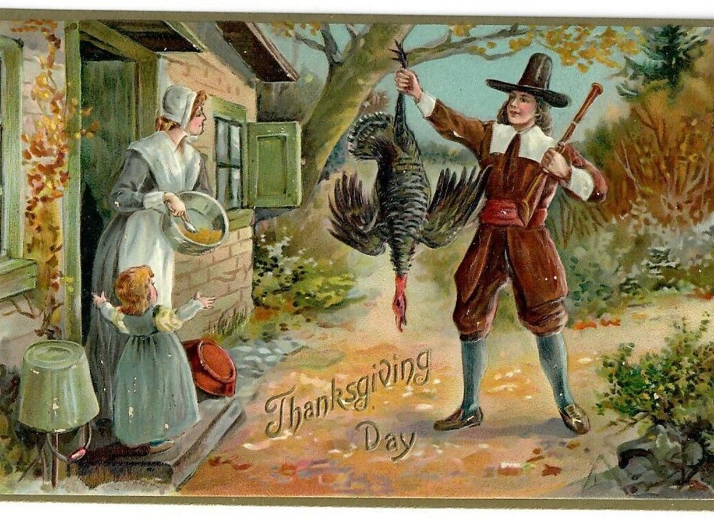 Man in Pilgrim dress holds up a turkey for his wife and child to behold. The card reads "Thanksgiving Day."
